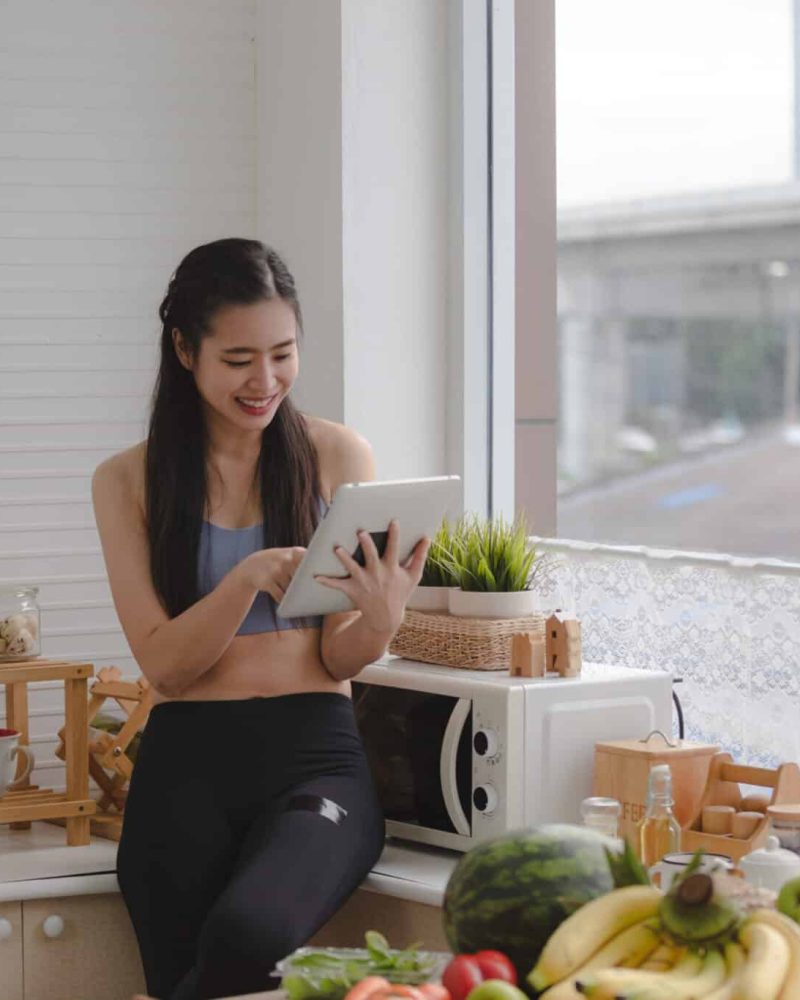 young Asian sport healthy woman are working for live streaming about fitness exercise lifestyle